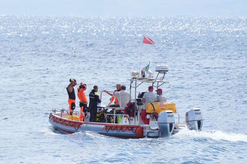 Italian emergency services headed out to sea towards the area off the Sicilian coast, where the search continues for six missing tourists.