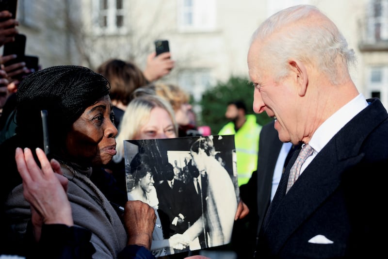 Caroline Akuffo showed Charles a photo of the pair meeting in Japan in 1970