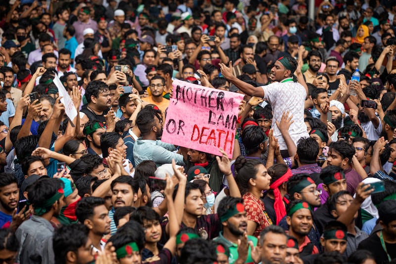 A protest against Prime Minister Sheikh Hasina and her government to demand justice for those killed in the recent deadly clashes, in Dhaka, Bangladesh (Rajib Dhar/AP)