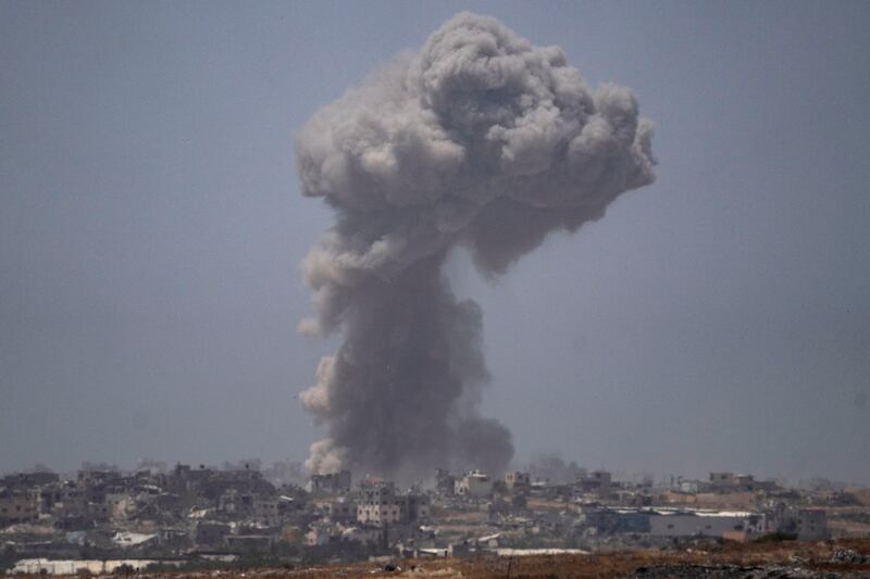 Smoke billows after an explosion in the Gaza Strip, as seen from southern Israel (Leo Correa/AP)