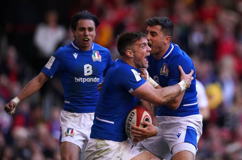 Italy players celebrate after scoring a late try against Wales during the 2022 Six Nations