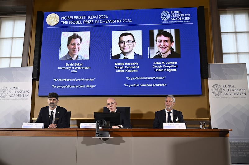 Johan Aqvist, Hans Ellegren and Heiner Linke, of the Nobel Committee for Chemistry, award this year’s prize to David Baker, Sir Demis Hassabis and John Jumper (Christine Olsson/AP)