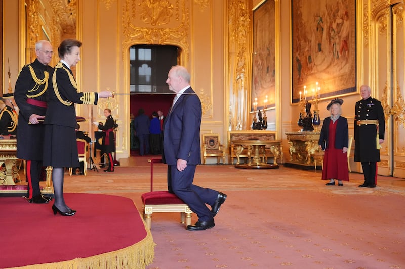 Sir Alan Bates was knighted by the Princess Royal at Windsor Castle