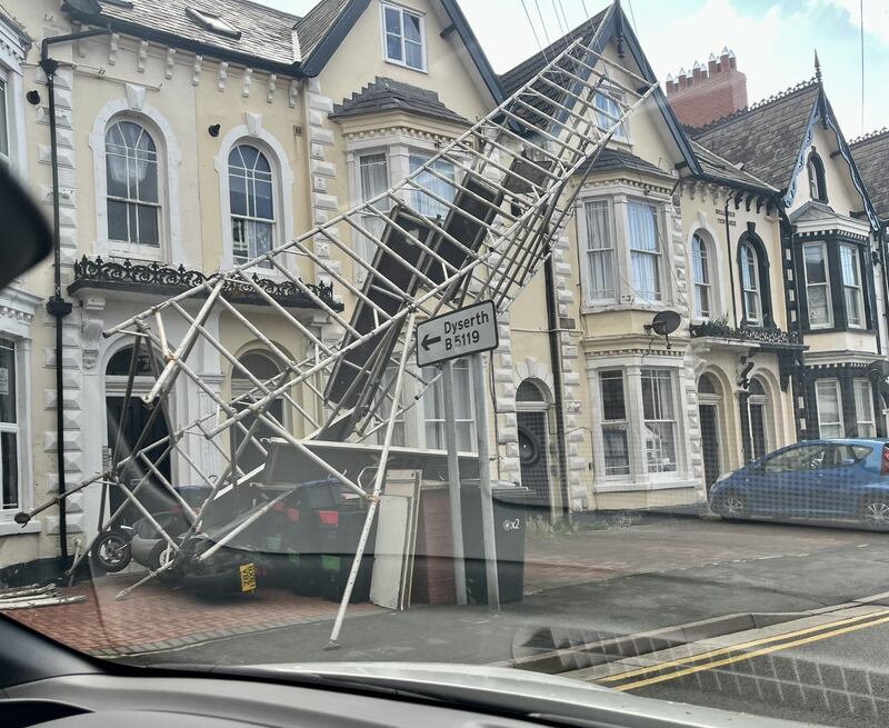 Scaffolding blown over amid high winds brought by the storm in Rhyl, North Wales