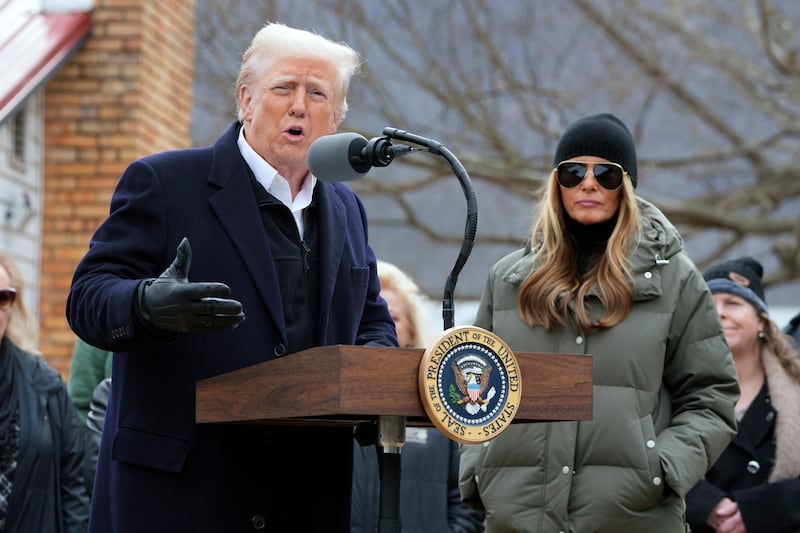 President Donald Trump, along side first lady Melania Trump speaks as he meets with homeowners affected by Hurricane Helene in Swannanoa (Mark Schiefelbein/AP)