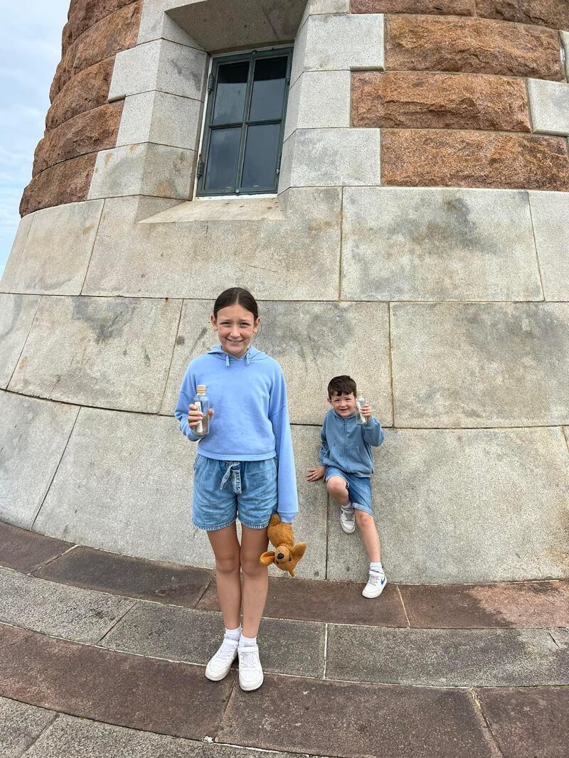 Grace and Harry with their bottles