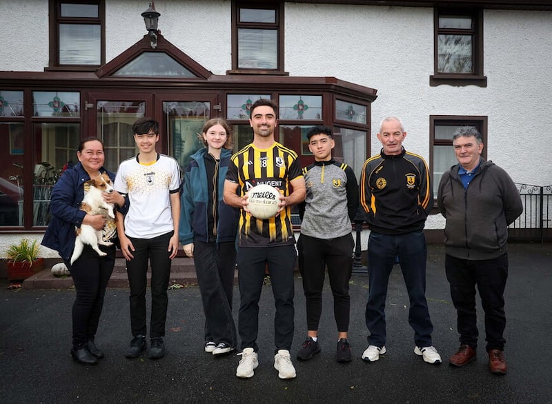 Pomeroy Plunketts player Aidan Coyle pictured with some of his relatives Luisa, John Paul, Ellie Jane, Martin, Noel and Peter. Picture: Mal McCann