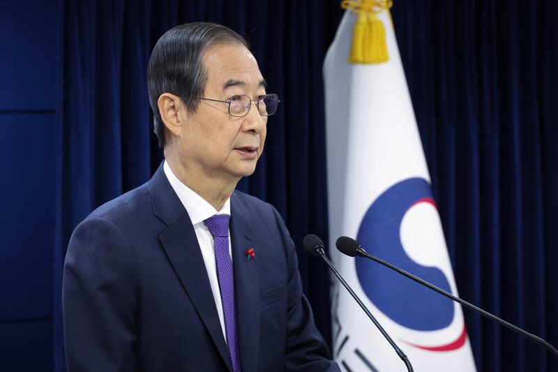 South Korean acting president Han Duck-soo has said he will not appoint the Constitutional court justices without bipartisan consent (Choi Jae-koo/Yonhap/AP)