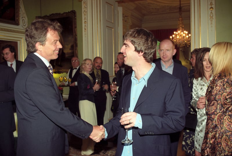 Tony Blair meets Oasis star Noel Gallagher at a reception held at 10 Downing Street