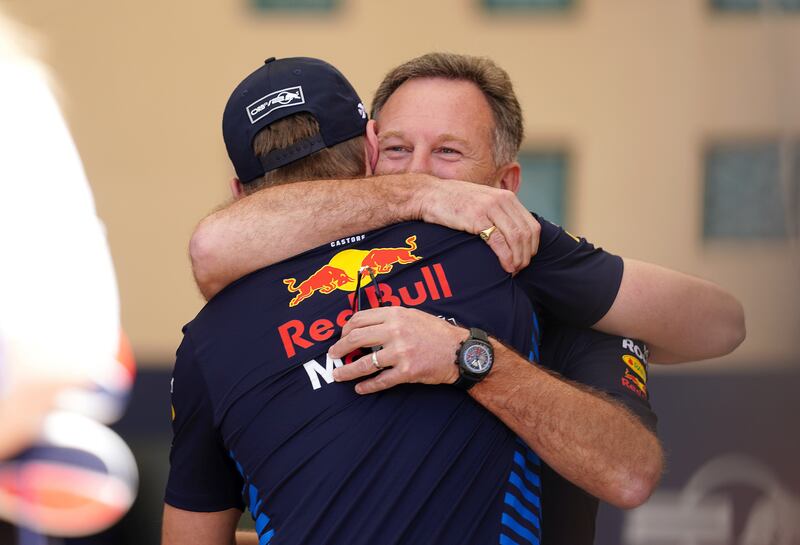 Max Verstappen embraces Red Bull team principal Christian Horner