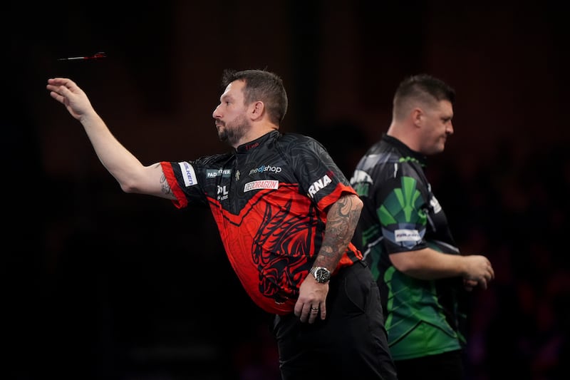 Jonny Clayton during his third round match against Daryl Gurney on day ten of the Paddy Power World Darts Championship at Alexandra Palace, London. Picture date: Friday December 27, 2024. PA Photo. See PA story DARTS World. Photo credit should read: Bradley Collyer/PA Wire.

RESTRICTIONS: Use subject to restrictions. Editorial use only, no commercial use without prior consent from rights holder.