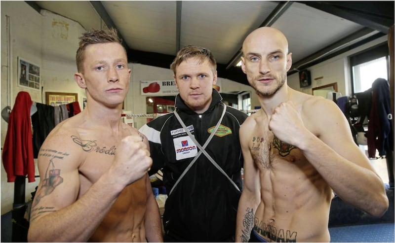 Boxers Fergal McCrory left Kieran Farrell and James Carney yesterday as they were weighing in for tonights fight in the Devenish Complex Belfast Picture by Hugh Russell 