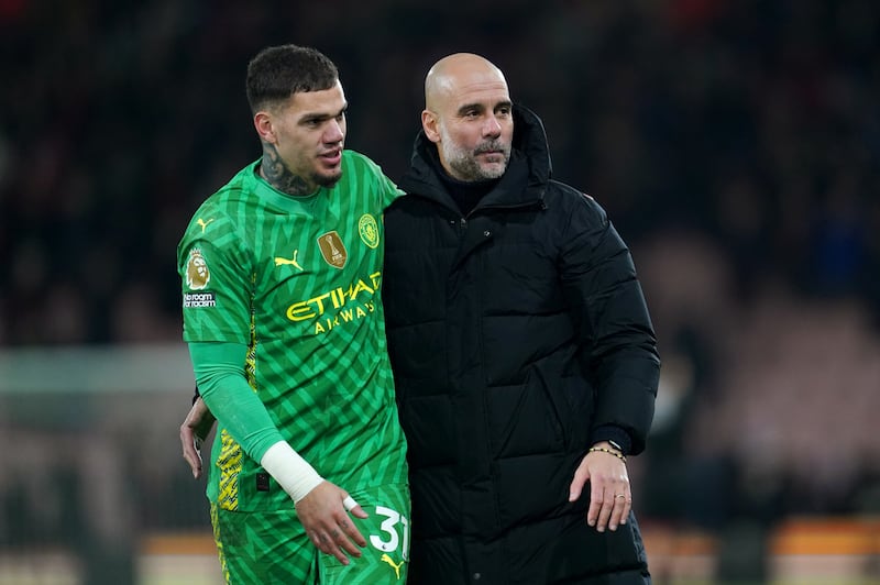 Pep Guardiola, right, feared Ederson, left, could leave Manchester City in the summer