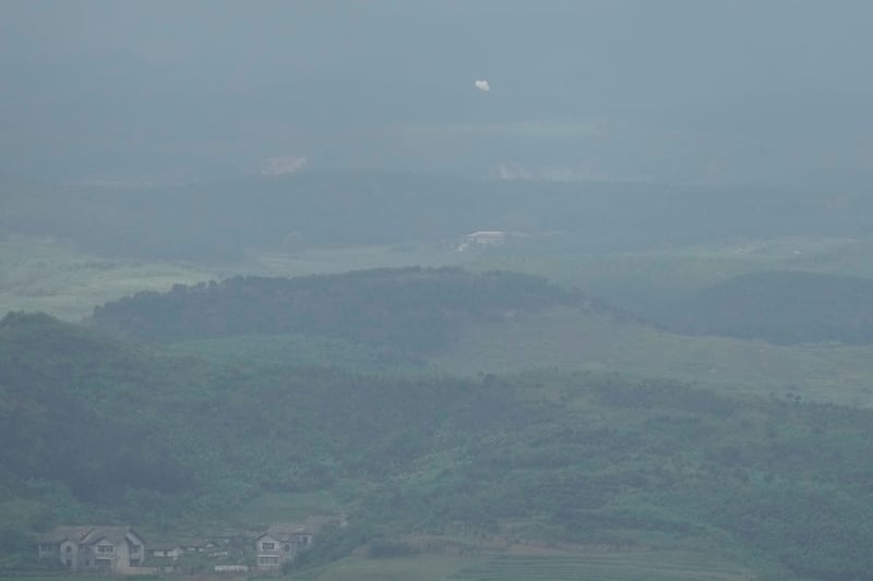 Balloons are seen from the Unification Observation Post in Paju, South Korea, near the border with North Korea (Lee Jin-man/AP)