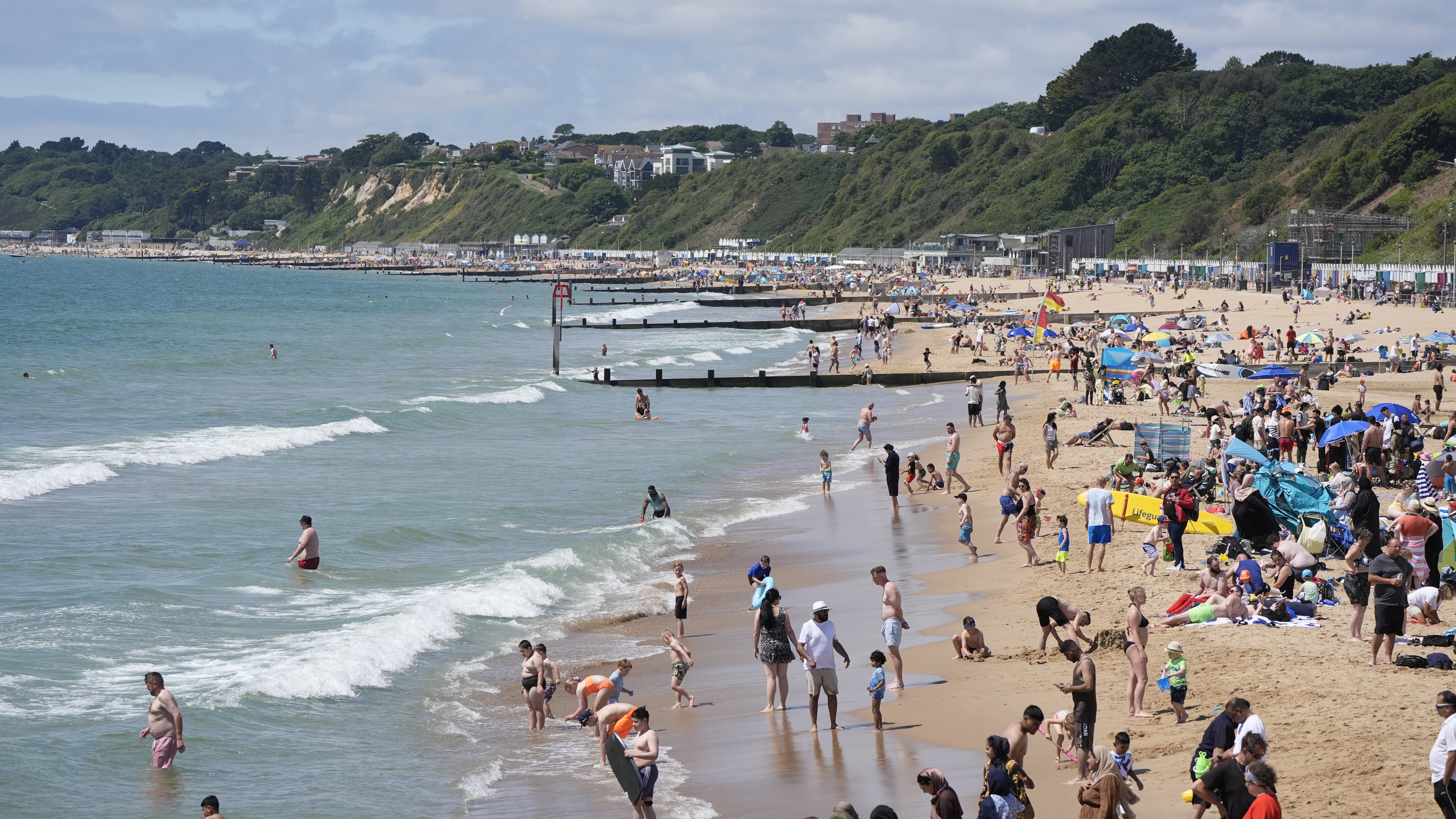The man was reported in water at Bournemouth Beach, which has seen hot, sunny weather in recent days
