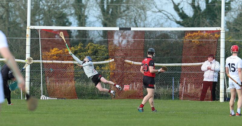 Down's Stephen Keith making the first penalty save of the game  during the GAA Allianz Hurling Division Two A Round Three  game between Down and Kildare at Ballycran on 02-25-2024.