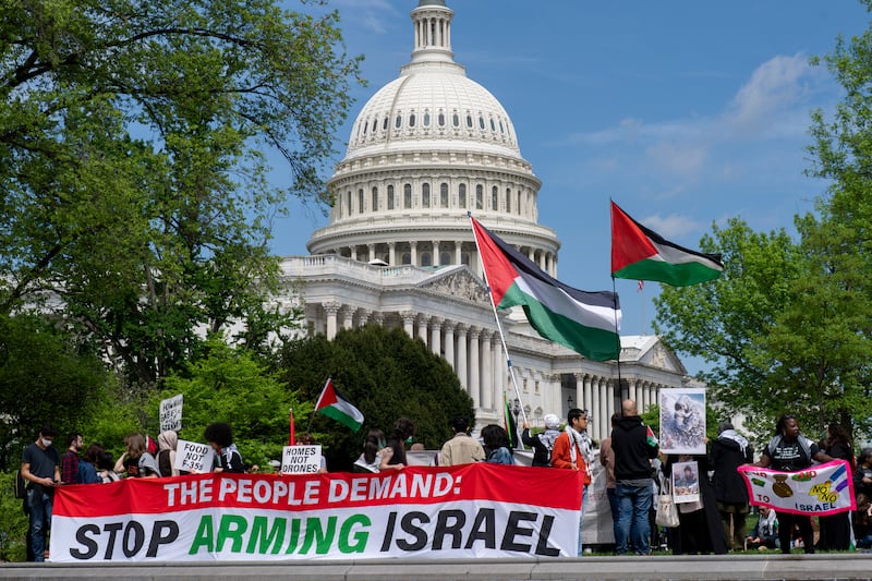 Pro-Palestinian activists demonstrate outside the Capitol in Washington (J Scott Applewhite/AP)