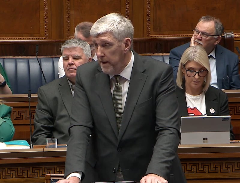 Infrastructure Minister John O'Dowd speaking in the Assembly on Monday