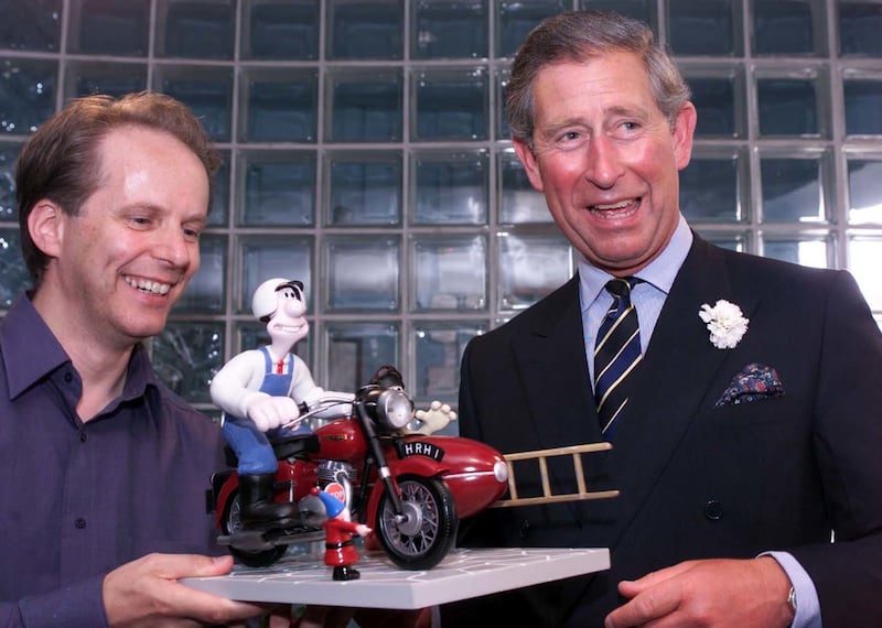 The then-Prince of Wales accepted a model of animated characters Wallace and Gromit from Aardman creator Nick Park in 2001