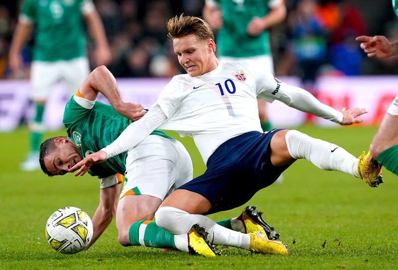 Martin Odegaard, right, damaged ankle ligaments while on duty for Norway in August