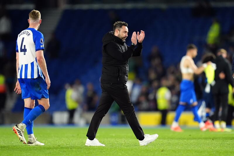 Brighton manager Roberto De Zerbi applauds the club’s supporters at full-time