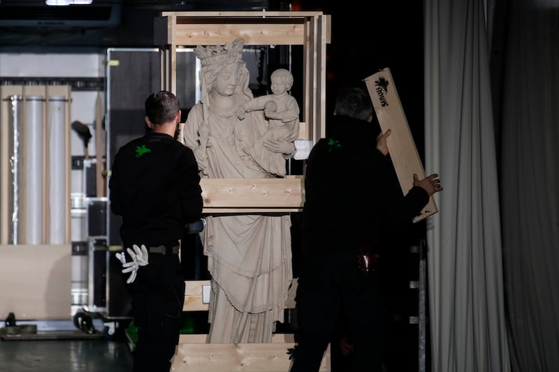 The original Virgin Mary statue, which did not suffer from the 2019 fire, is displayed before returning to Notre Dame Cathedral (Louise Delmotte/AP)