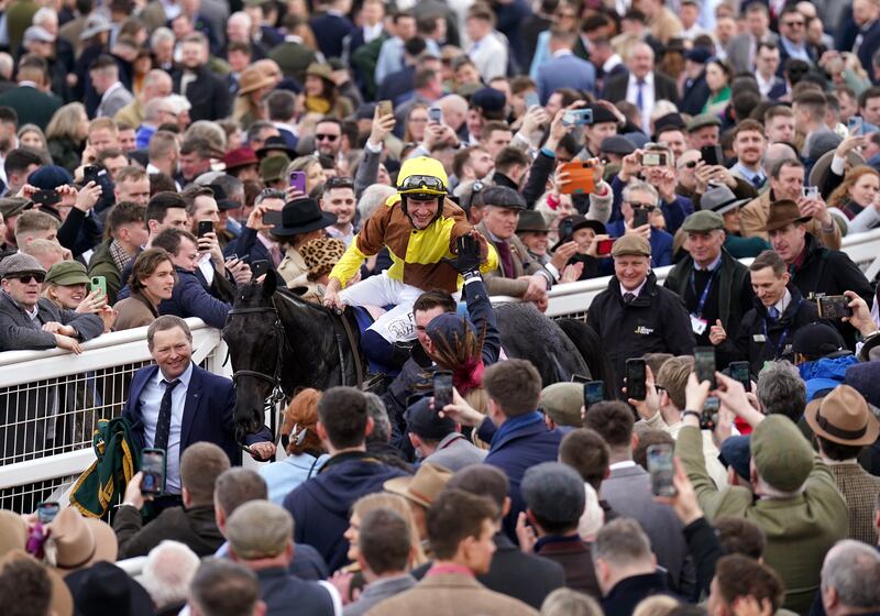 Jockey Paul Townend and Galopin Des Champs make their way back in after winning the Boodles Cheltenham Gold Cup Chase.