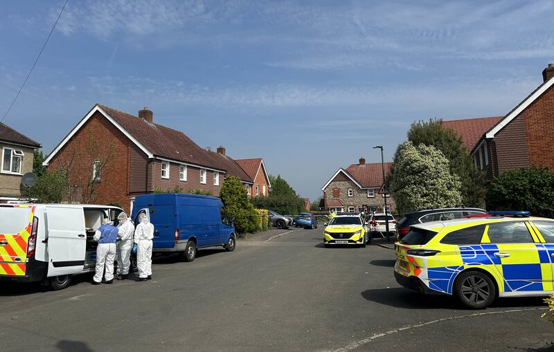 Police and forensic investigators at the scene in High Wycombe