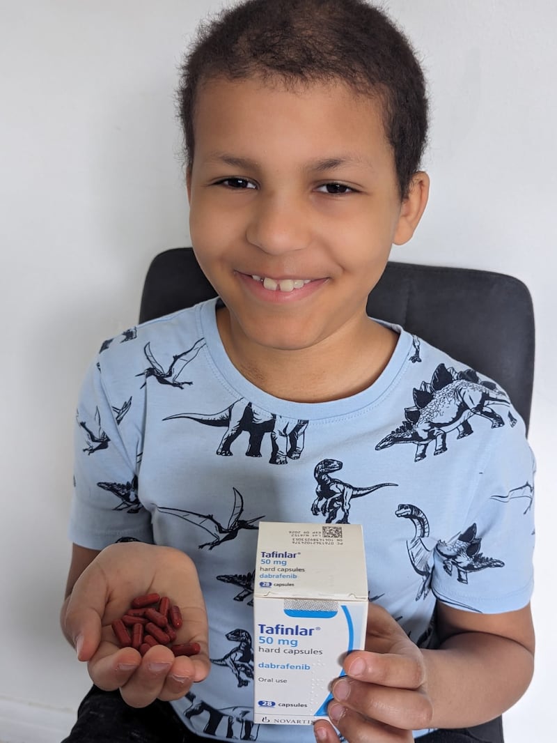 Alexander Josephs, 10, pictured with his brain tumour medication, which his family has been able to access for the first time on the NHS. For two and a half years they were spending thousands of pounds a month to access the drug privately with the help of crowdfunding.