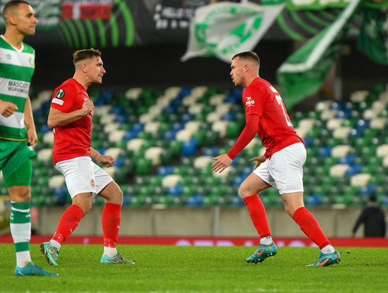 Chris Gallagher of Larne scores and pulls a goal back against Shamrock Rovers in this evening’s game.