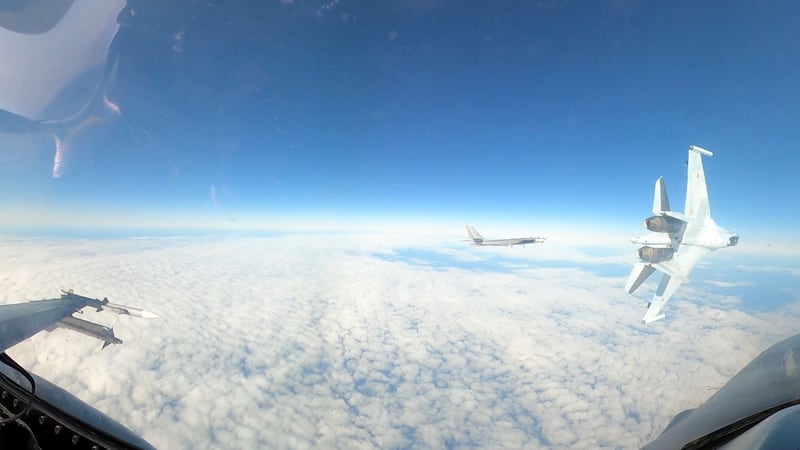 A US Air Force F-16 conducts a routine intercept of a Russian Tu-95 aircraft in the Alaskan Air Defence Identification Zone (Department of Defence/AP)