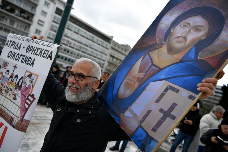 Some Church supporters staged protests against the proposed law (AP Photo/Michael Varaklas)