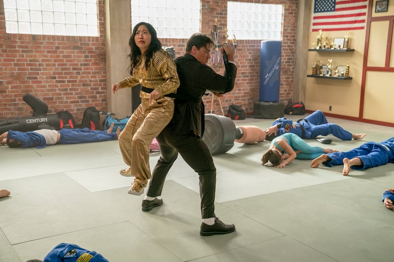 John Cena and Awkwafina in a scene from Jackpot! (Prime Video via AP)