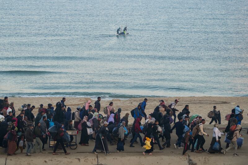 The ceasefire deal appears to be holding up as Palestinians return to northern Gaza (AP)