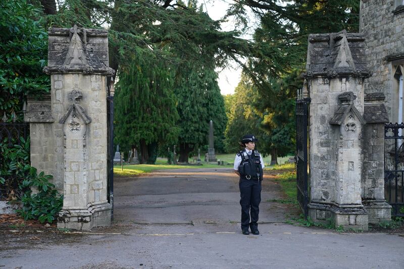 Police at the cemetery in Enfield, north London, where Kyle Clifford was found