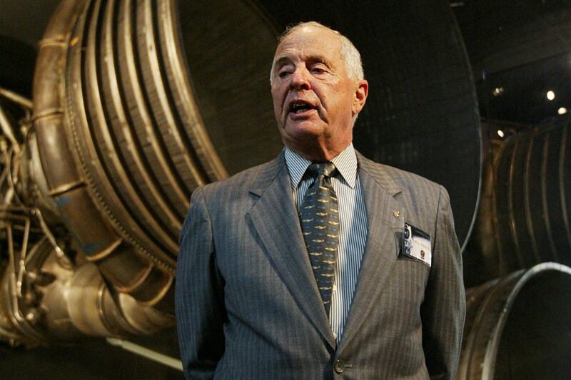 Apollo 8 Lunar Module Pilot William Anders, speaks to reporters in front of the Saturn 5 Aft End in 2004 (AP)
