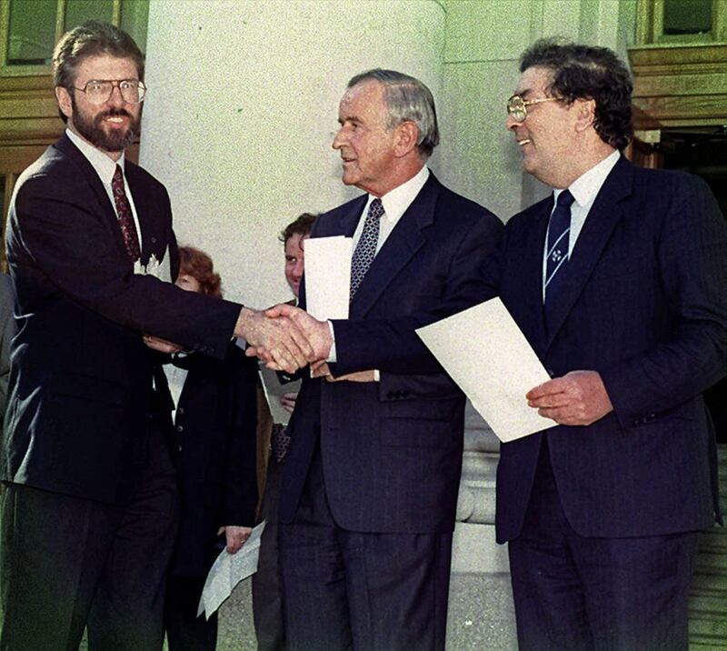 Former Taoiseach Albert Reynolds (centre) with Sinn Fein's Gerry Adams (left) and SDLP leader John Hume after the IRA's 1994 ceasefire 
