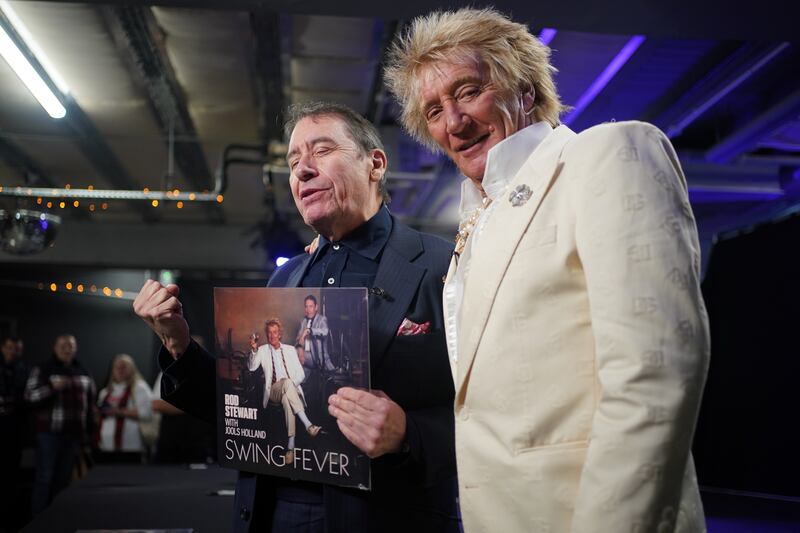 Jools Holland and Rod Stewart during a signing session for their collaborative studio album, Swing Fever