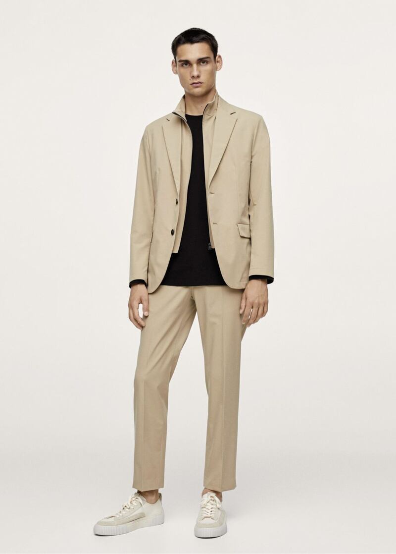 Mango Slim Fit Technical Packable Suit Blazer, &pound;59.99 (was &pound;119.99); Technical Packable Collection Slim-fit Trousers, &pound;29.99 (were &pound;59.99), available from Mango 