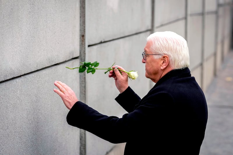 Dignitaries including German President Frank-Walter Steinmeier attended a flower laying ceremony (AP)