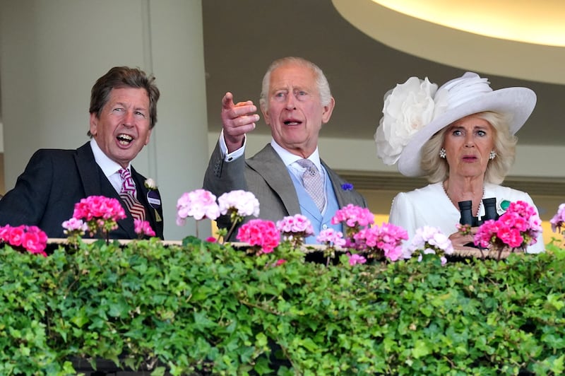 The King, Queen (right) and racing adviser John Warren react during the King George V Stakes