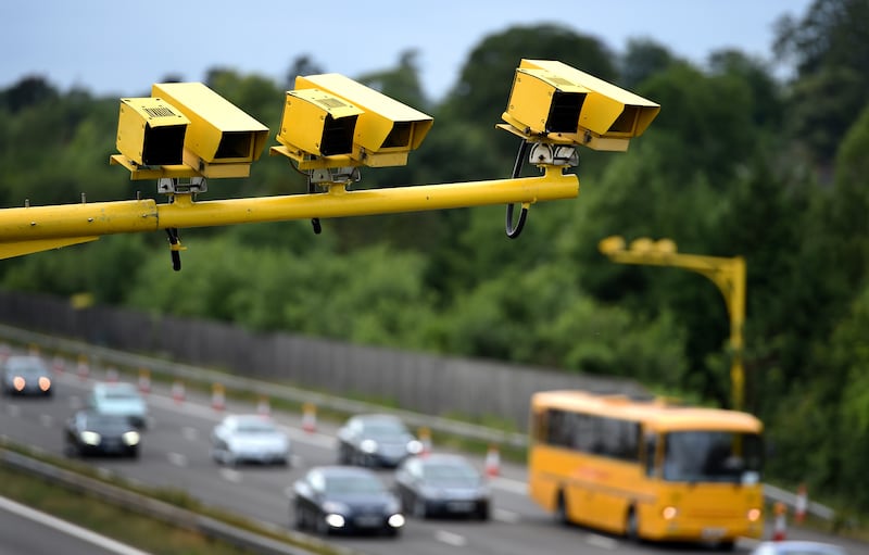 General view of three SPECS Average Speed cameras in position on the M3 motorway in Hampshire