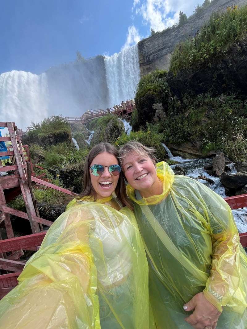 Hannah (right) and Grace in their rain ponchos at Cave of the Winds