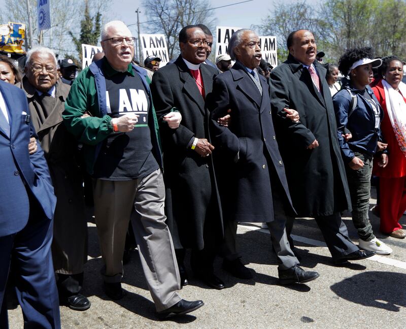 James Lawson joins a march in commemoration of the 50th anniversary of the assassination of Martin Luther King Jr (Mark Humphrey/AP)