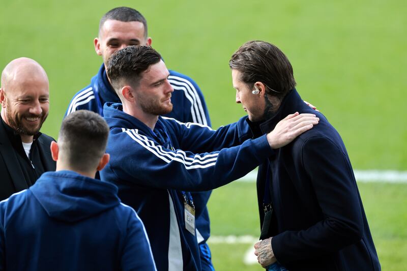 Andy Robertson greets team-mate Dykes at Hampden