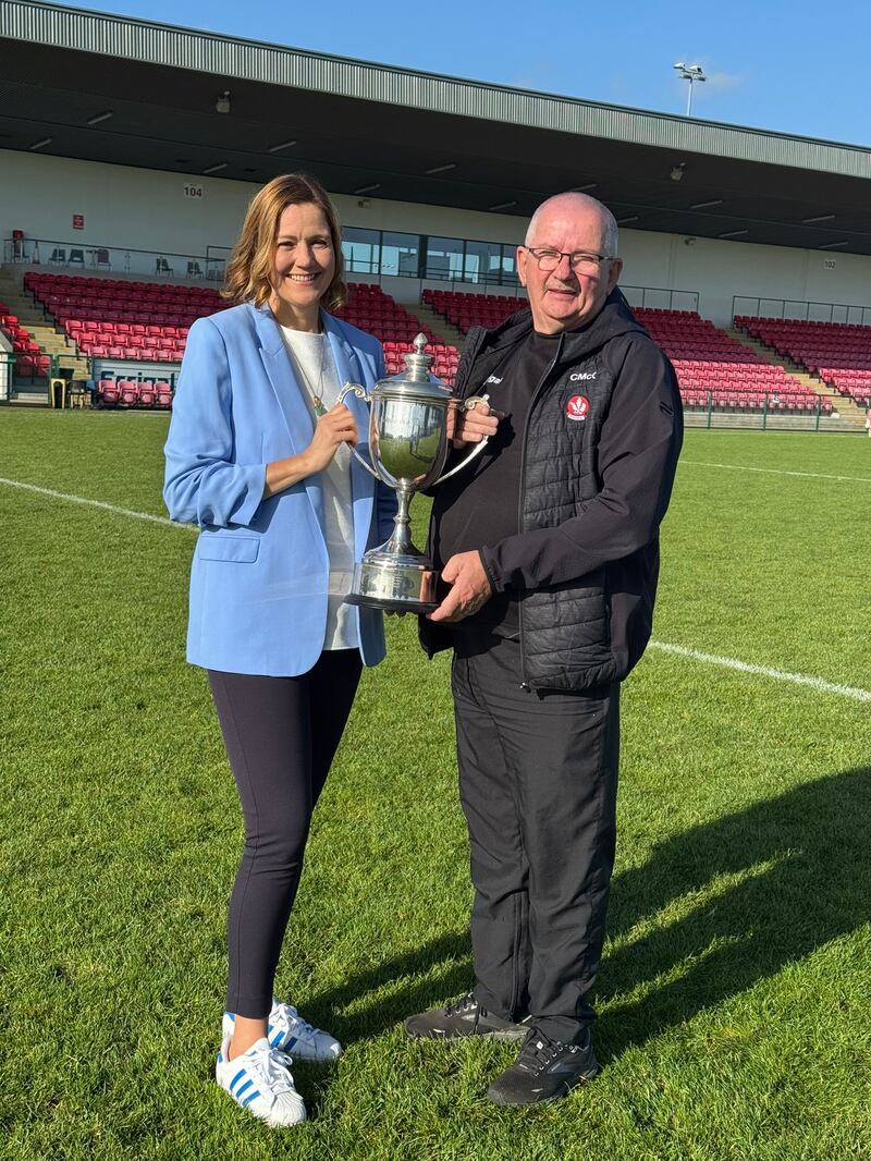 Gráinne McElwain and Colm McGuigan with the Jim McGuigan Cup