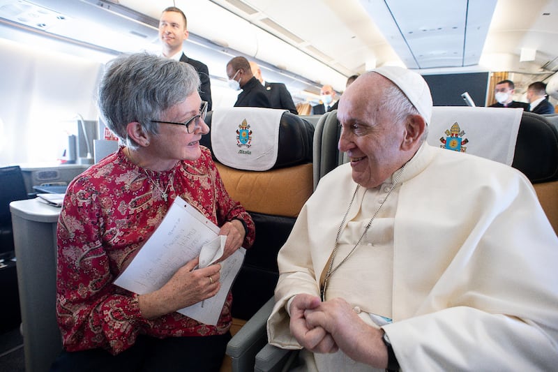 Donaghmore, Co. Tyrone native Regina Lynch, Executive President of Aid to the Church in Need International, accompanying Pope Francis aboard the papal plane on the Pontiff’s visit to Iraq in March 2021. Photo: Vatican Media