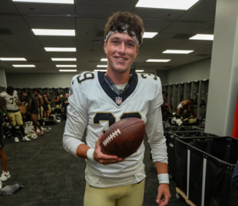 Charlie Smyth pictured with the ball he kicked to win the game for the New Orleans Saints. PICTURE: Layne Murdoch Jr