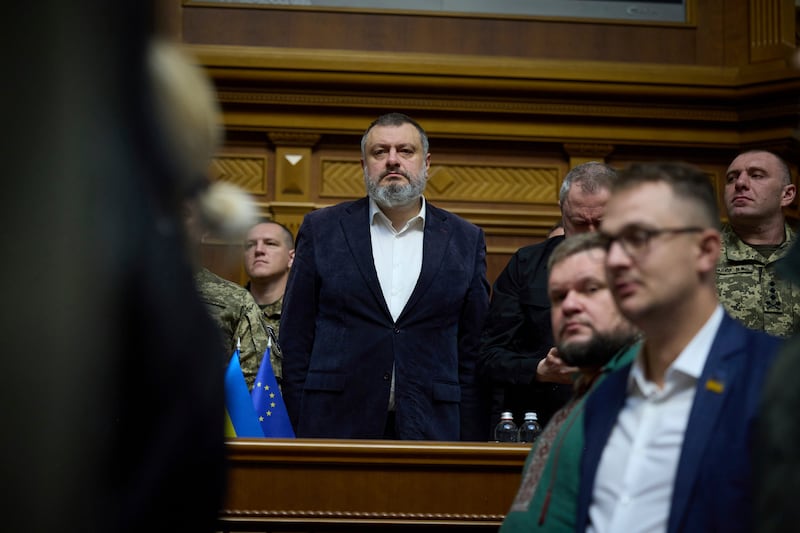 Oleksandr Lytvynenko, head of the Foreign Intelligence Service of Ukraine, listens to a speech by President Volodymyr Zelensky (Press Service Of The President Of Ukraine/AP)