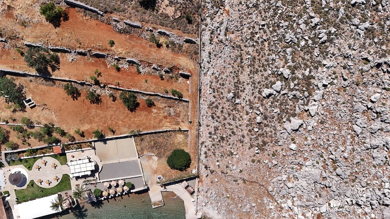 The Agia Marina beach area in Symi, Greece, where the body of TV doctor and columnist Michael Mosley was discovered during a search and rescue operation